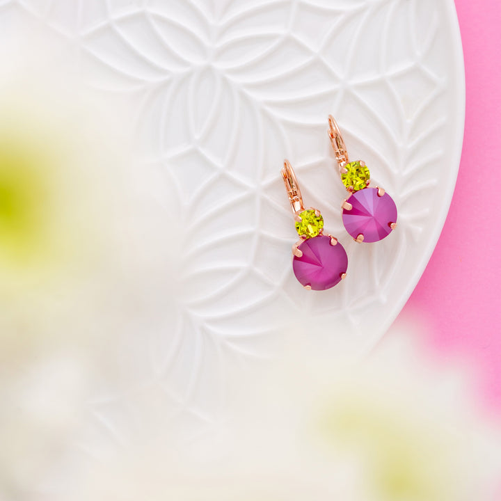 Peony pink and citrus green dangling earrings on plate with flowers